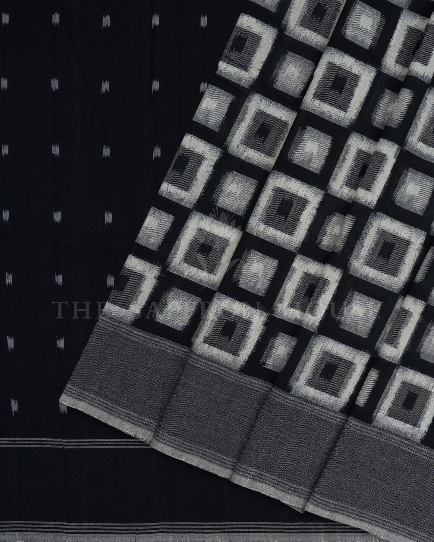 Pure White And Onyx Black Handwoven Patola Saree – The Saffron House