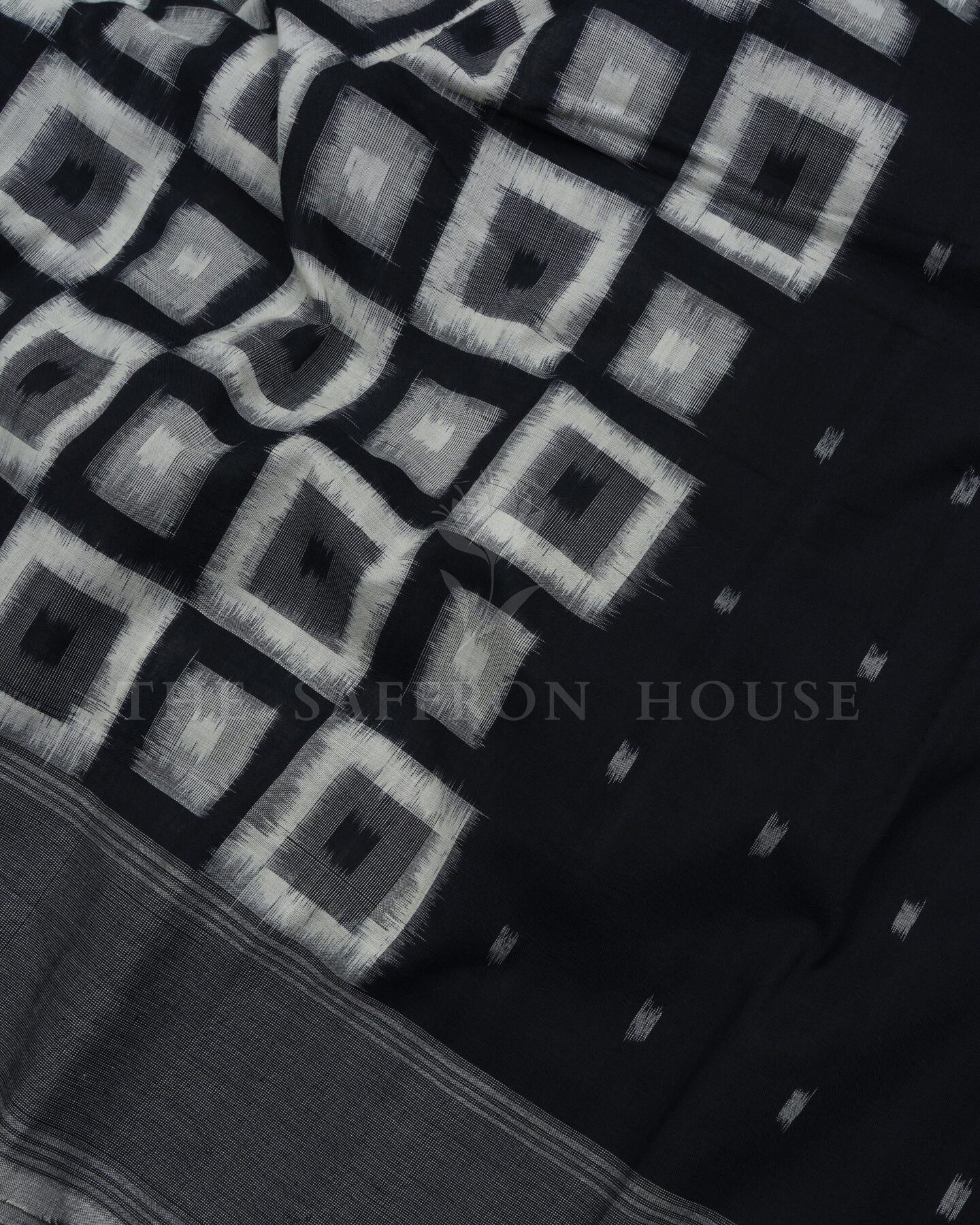 Pure White And Onyx Black Handwoven Patola Saree – The Saffron House