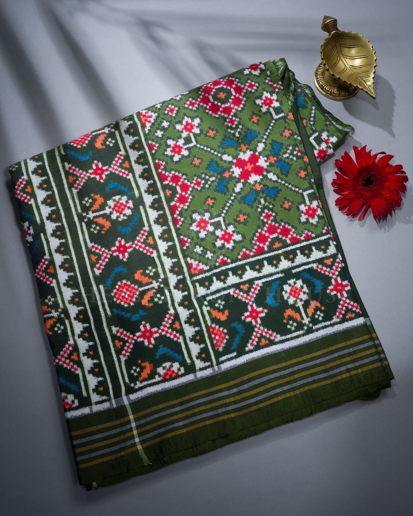 Olive Green Handwoven Patola Saree – The Saffron House