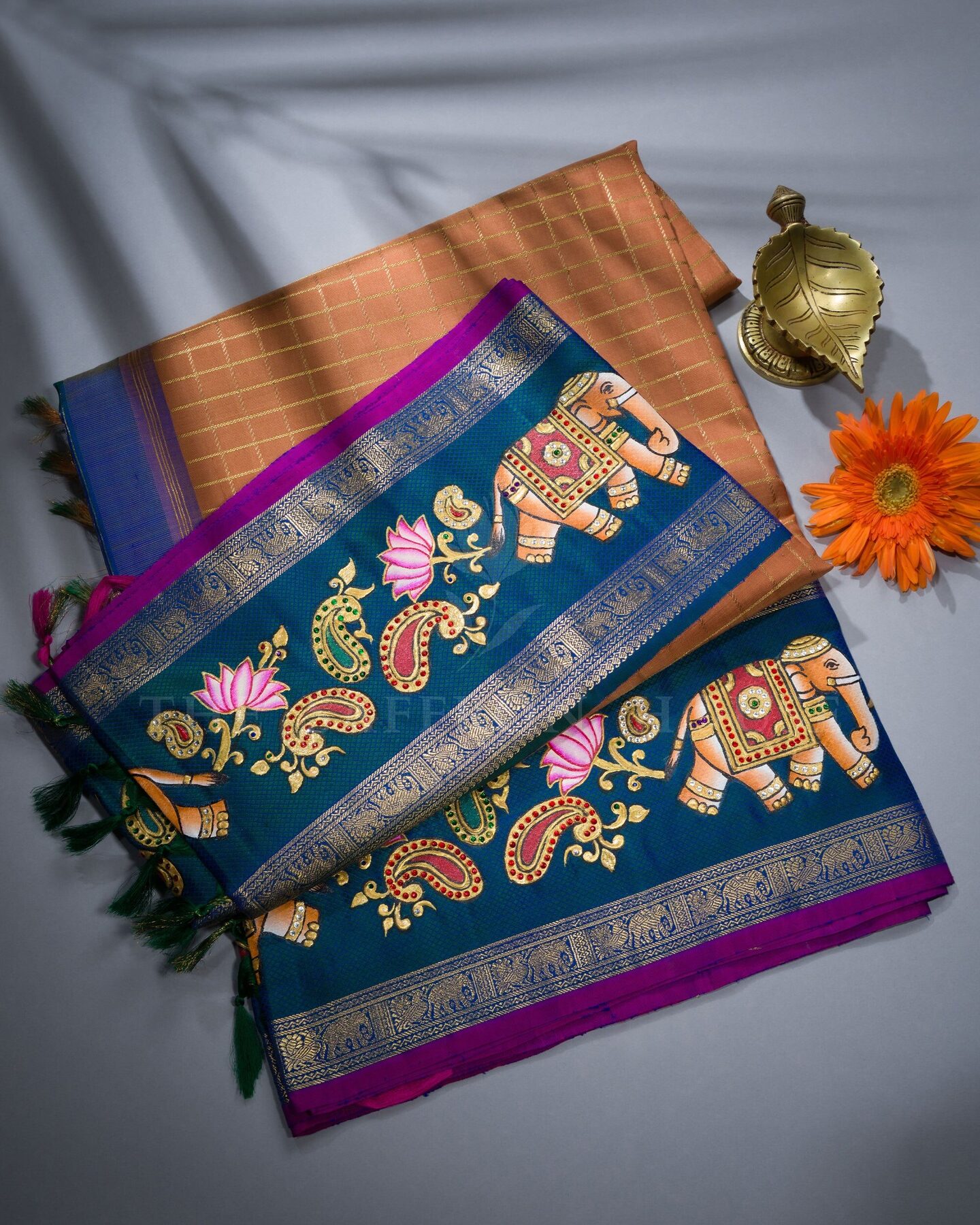 Rust Orange And Peacock Blue Korvai Kanjivaram Silk Saree